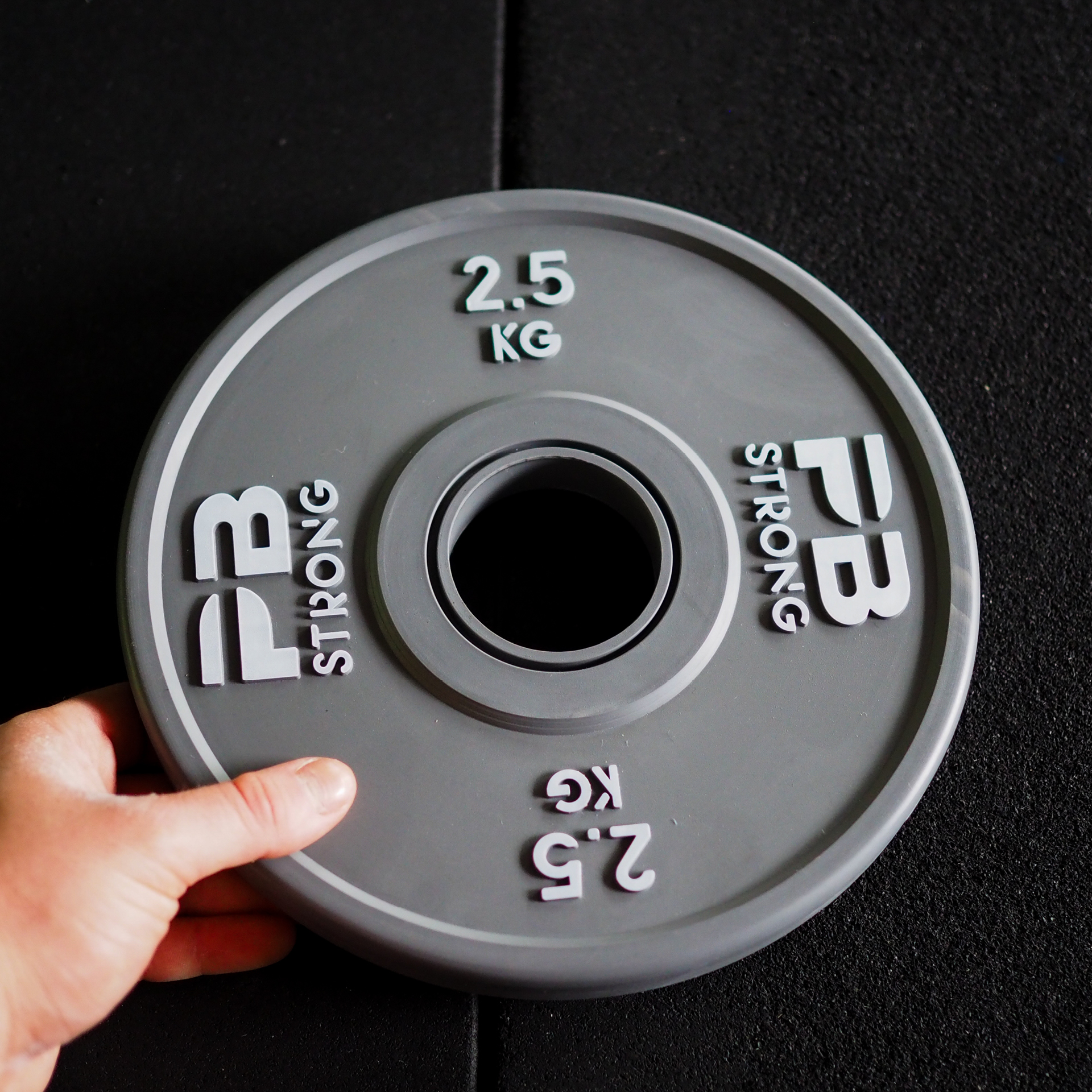 PB Strong Wettkampf Hantelscheibe (Stk) Grau 2,5 kg PB Strong Wettkampf Hantelscheibe (Stk) Grau 2,5 kg